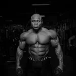 Conexão mente-músculo: o que é e como estabelecer ela durante o treino? Kay Greene atleta que preconizou a conexão mente-músculo